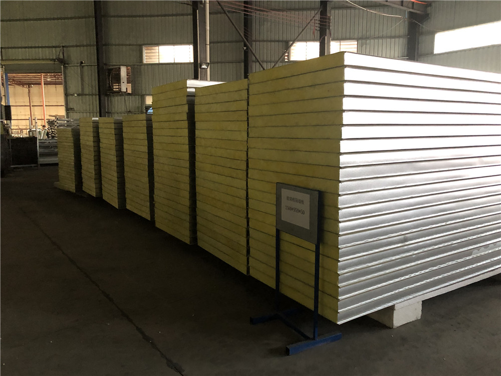 Glass wool sandwich roof panels production at factory